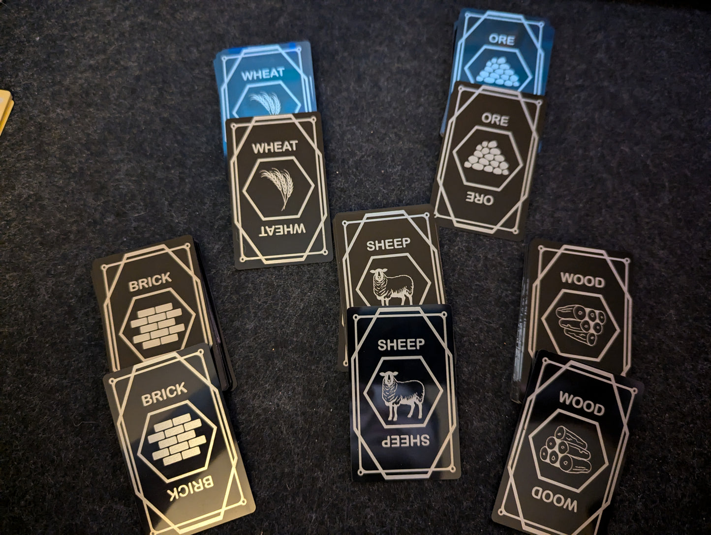 Custom Metal Settlers of Catan cards for Sea Farers and Cities and Knights